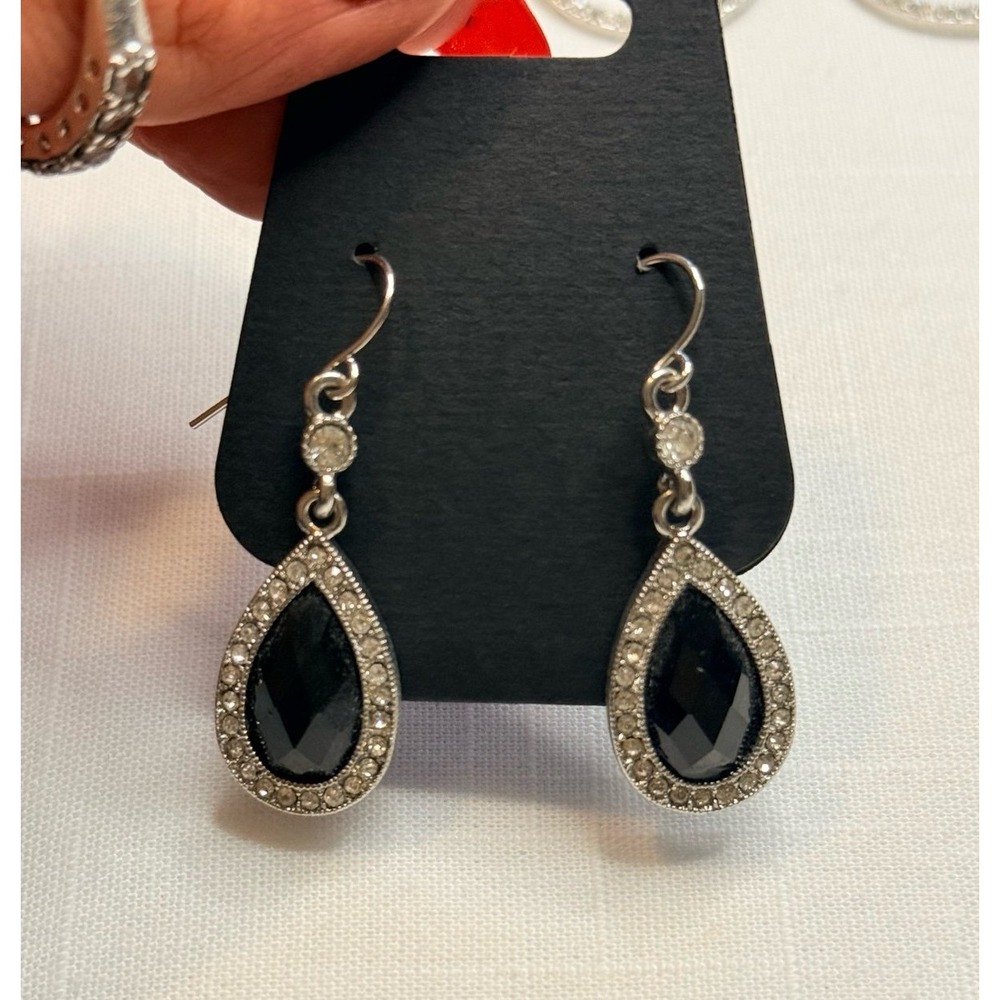 Black teardrop silver earrings with rhinestone border and clover back